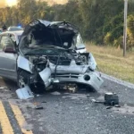 A somber scene depicting the aftermath of the Ahmir King-Holland car accident, highlighting the impact on the community.