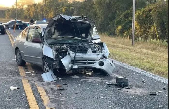 A somber scene depicting the aftermath of the Ahmir King-Holland car accident, highlighting the impact on the community.