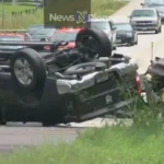 A wrecked car on the side of the road in Bastrop, Texas, highlighting the devastating impact of Bastrop TX car accidents on the community.