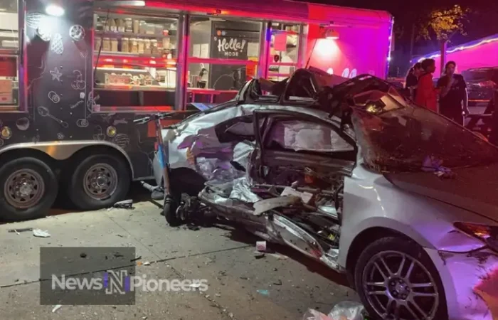 A car accident scene on a busy Austin, TX street, highlighting the importance of safe driving practices.