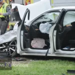 A somber scene depicting the aftermath of the Clayton Hughes car accident, highlighting the tragic loss of life and the need for road safety awareness.