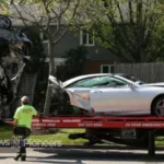 Scene from the Glenview car accident lake showing emergency responders and damaged vehicles involved in the crash.