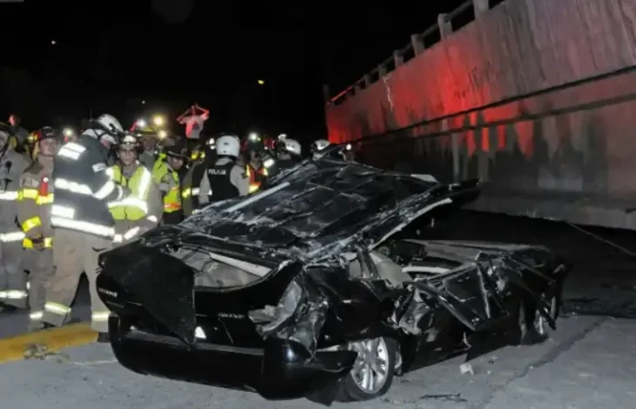  A somber scene depicting the aftermath of the Luis Cevallos car accident, highlighting the tragic loss of life.