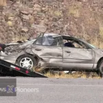 A tragic scene of the NM 502 car accident near Camino Entrada, capturing the aftermath and emergency response.