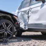 A dramatic scene of a t bone car accident at an intersection, highlighting the impact and aftermath of such collisions.