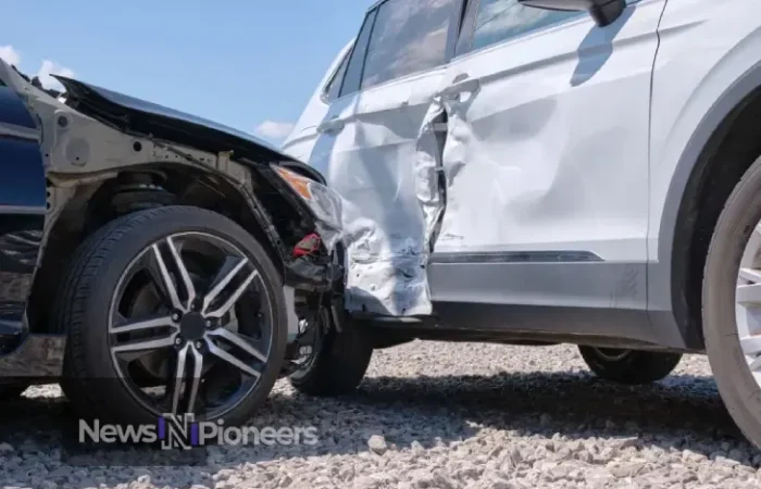 A dramatic scene of a t bone car accident at an intersection, highlighting the impact and aftermath of such collisions.