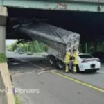 An image depicting a serious 495 car accident, showcasing emergency responders at the scene of a multi-vehicle crash.