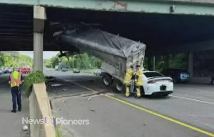 An image depicting a serious 495 car accident, showcasing emergency responders at the scene of a multi-vehicle crash.