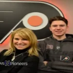 Carter Hart Wife Kaitlyn supporting him at a Flyers game, showcasing their private yet strong relationship.