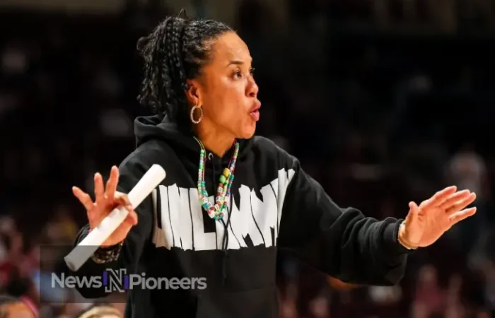 "Dawn Staley coaching South Carolina Gamecocks to victory, showcasing her legendary leadership in women's basketball.