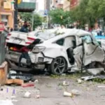 A busy intersection in Brooklyn where a car accident recently occurred, highlighting the dangers of driving in this bustling area.