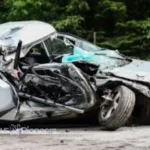 A serious Jacksonville car accident scene showing emergency responders assisting injured individuals and damaged vehicles.